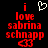 Red pixelated text 'i love sabrina schnapp' with a white heart above and red smiley below on black background, showing animation