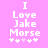 Pixelated text on pink background reads "I Love Jake Morse" with four symbols below, two white and two light purple.