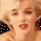 A four- shows a person with blonde hair and red lips in sequential poses against black-and-white polka-dot background
