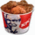 A red and white bucket filled with fried chicken pieces, next to pixelated text reading 'Lets Stop The Madness' in black.
