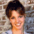 A 50x50 pixel buddy icon split into two sections: a left-side photo of a person with short dark hair lying on patterned fabric and a right-side green background with bright green text reading "Original Icons .com" in a stylized font.
