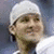 Pixelated image of a person wearing a white headband and white shirt with blue text reading "I Love Tony Romo" on the right side.
