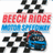 Pixelated racing-themed icon with checkered flag, car, and text elements in red, blue, and cyan on black and white backgrounds.