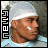 Two side-by-side animated frames of a pixelated buddy icon showing a person with a white headband and light blue shirt against a gray background, with mirrored text on the left edge.