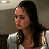 A woman with long dark hair in a white spaghetti-strap top appears in four , with the rightmost showing text