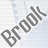 Two animated frames of a pixelated 'BROOK' text icon on a light blue striped background with gray transparency.