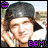 Pixelated static image of a person wearing a dark cap with long hair, set against an outdoor background with purple text and symbols.