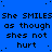 Blue background with repeated black text reading "She SMILES as though shes not hurt" in three , each containing four identical repetitions of the phrase