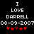 Black background with white pixelated text reading "I LOVE DARRELL 08-09-2007" and red heart symbols below, showing animation changes in heart positions.