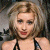 A pixelated contact sheet showing two frames of an animated icon featuring a woman with blonde hair and red lipstick on the left, next to green text reading "Original Icons .com" on a dark green background.