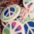 Six distinct peace symbol designs displayed in a , each with unique color schemes and artistic styles