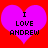 Two identical purple hearts on red background with black text reading "I LOVE ANDREW" in pixelated font.