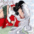 Animated character with long white hair and red clothing in a dynamic pose against light background.