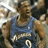 Pixelated image of a person in a blue sleeveless shirt with white text and number, next to solid blue background with black pixelated text.