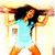 Pixelated figure with dark hair, light blue top, and orange limbs in dynamic pose against light background.