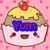 Pixelated cupcake with smiling face, yellow frosting, brown layer, strawberry on top, pink polka-dot background; text overlays change across frames.