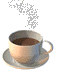 Four identical cups of brown liquid on saucers arranged in a against a gray background