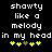 Pixelated text reads 'showty like a melody in my head' with yellow and green plus signs below, displayed on black background.