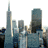 Four distinct cityscape views of a skyline with tall buildings, each in different color schemes and backgrounds.