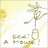 A pixelated image shows a stylized figure with outstretched arms against a bright yellow and white background, with partial text below.