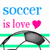 Blue 'SOCCER' text above pink 'is love' with heart symbol, over green and white striped background with pixelated sunglasses.