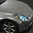 Animated sequence showing a silver car's headlight transitioning from blue to white illumination, with close-ups of the Z-shaped emblem and front grille.