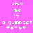 Pixelated text on a bright pink background reads 'kiss me in a gymnast' with four heart symbols below, two white and two light purple.