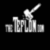 Pixelated grayscale icon shows a figure with raised arm holding an object, standing behind stacked cylindrical shapes on black background.