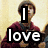 A four- shows a person in a maroon hoodie with text overlays changing , displaying 'I love freddie high-more' as the final phrase