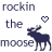 Pixelated image with text "rockin the moose" and a heart symbol, featuring two dark blue moose silhouettes on white background.