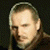 Static image shows a person with light hair against dark background, next to green text reading 'Original Icons .com' in pixelated font.