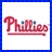 Two side-by-side pixelated text-based icons on white backgrounds with blue checkered borders, one reading 'Phillies' in red script and the other 'GO CUBS!' in black block letters.