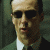 six identical pixelated images showing a man in sunglasses, green jacket, white shirt, and dark tie against a blurred background