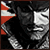 Pixelated grayscale image of a figure with a large head and dark clothing, partially overlaid by a red and white striped shape on the left.
