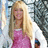 Pixelated image of a person with long blonde hair in a pink dress and white jacket, surrounded by cyan text on black background.