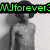 six black-and-white and color images featuring a person in various poses with green text overlays reading "MJforever," "Loves," "Michael," "Jackson," and "Forever." The central image shows the person wearing a white suit against a blue background