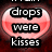 Six heart-shaped icons with pink gradients display text phrases like 'drops were kisses' and 'i love you mikey', each on a dark red background.