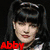 Four pixelated show a person with black hair in various poses and expressions, each labeled with red text