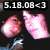 Pixelated image showing two pink glowing objects with a bright white center, a small blue and white object below, and white text reading '5.18.08<J' on a black background.
