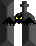 Pixelated bat silhouette with glowing eyes between two gray stone pillars, one frame showing yellow eyes and the other red eyes.