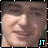 Two side-by-side pixelated images of a person's face with slight variations in facial expression and lighting, each featuring cyan 'JT' text at the bottom right.