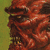 A pixelated red monster face with sharp teeth and glowing eyes on a green background, next to green text reading 'Original Icons .com'.
