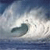 Static 50x50 pixel icon depicting a surfer riding a wave in blue and white tones with visible dithering and low-resolution rendering artifacts.