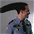 A 50x50 pixel animated buddy icon featuring a cartoon police officer on the left and green text reading "Original Icons .com" on the right, displayed as a contact sheet with two frames.