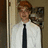 A pixelated image of a person in a white shirt and dark tie with red hair, next to text reading "this is what a... NERD LOOKS LIKE!!!" and "tehehe Emily and Saraa".