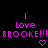 Pixelated pink text and heart symbols on black background with gray corner overlay