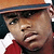 A pixelated contact sheet showing two frames of an animated buddy icon with a person wearing an orange cap and red shirt on the left, and orange text reading "SO SEXI" on the right against a white background.