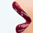 Animated contact sheet showing three frames of a red lip-shaped icon with text variations on white and gray backgrounds.