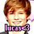 Pixelated image of a smiling person with brown hair, wearing a dark jacket over a light shirt, with pink text reading 'lucas' and a heart symbol below.