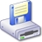 Pixelated blue and white floppy disk with a yellow document icon on top, resting on a gray base.
